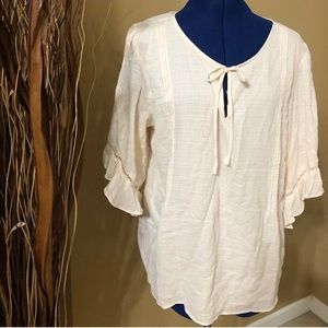 Cream colored light weight top